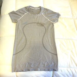 lululemon swiftly tech short sleeve shirt size 6; sticker residue on front
